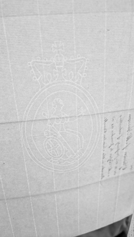 Blank page with Britannia watermark and illegible show-through text