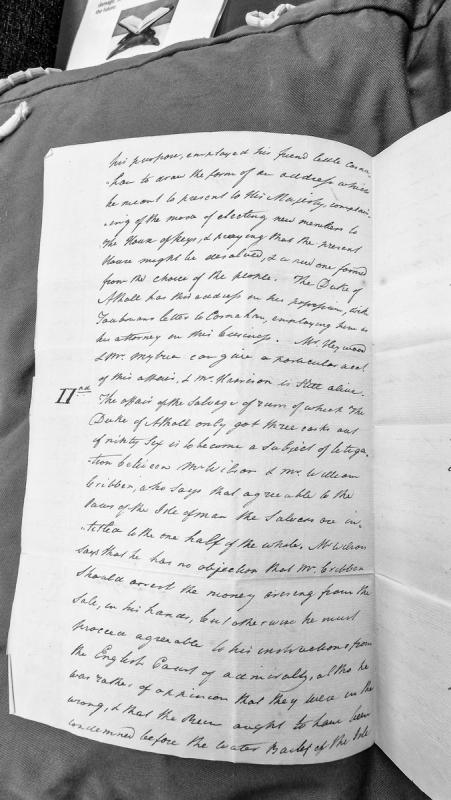 Account of disputes over House of Keys election petition and salvage rights for rum.